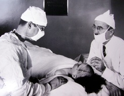Freeman and Watts operate on a patient