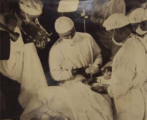 Photograph of Sarnoff performing an operation.